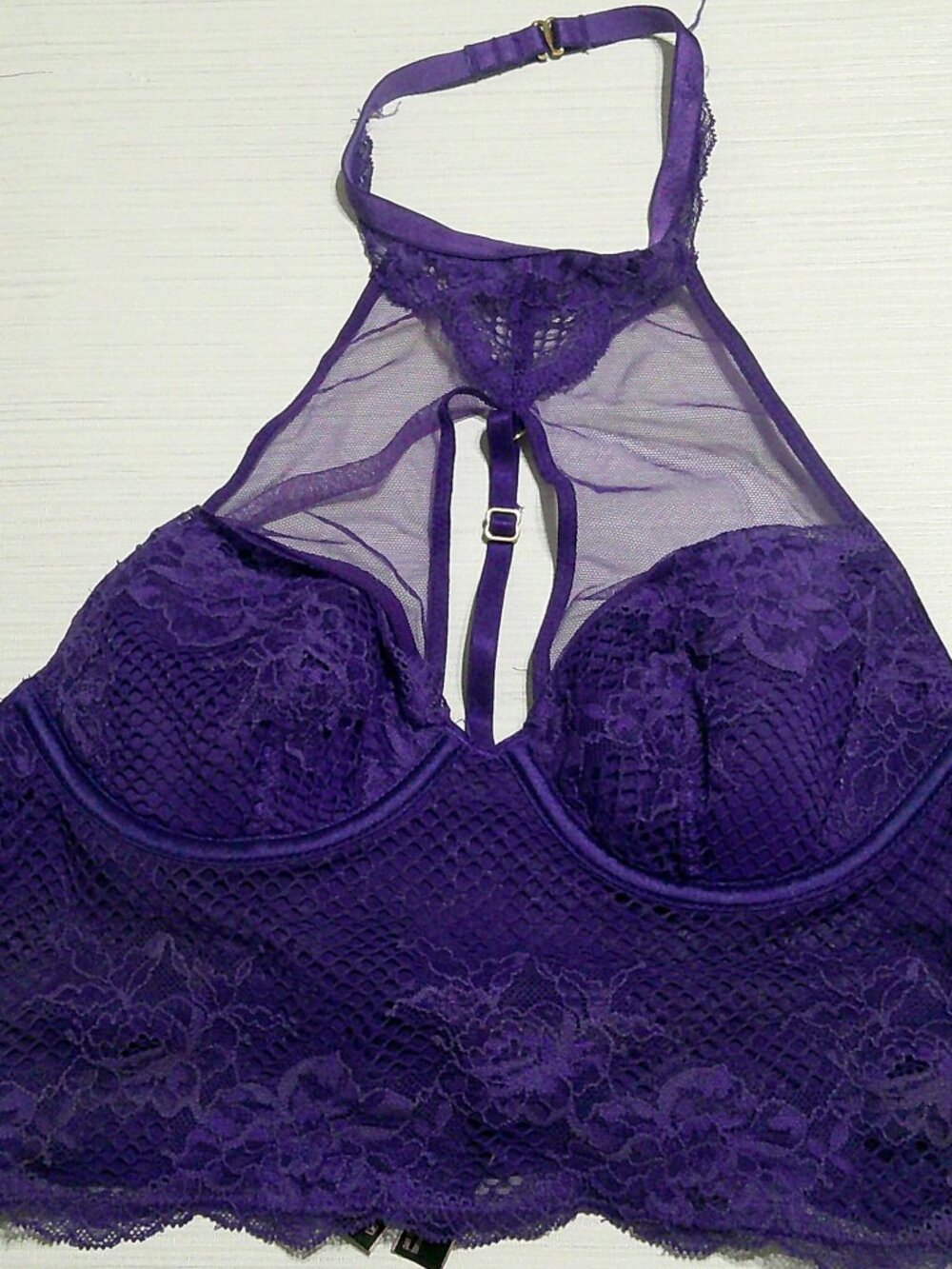 The product is a Victoria's Secret high-neck longline corset bra in size XS